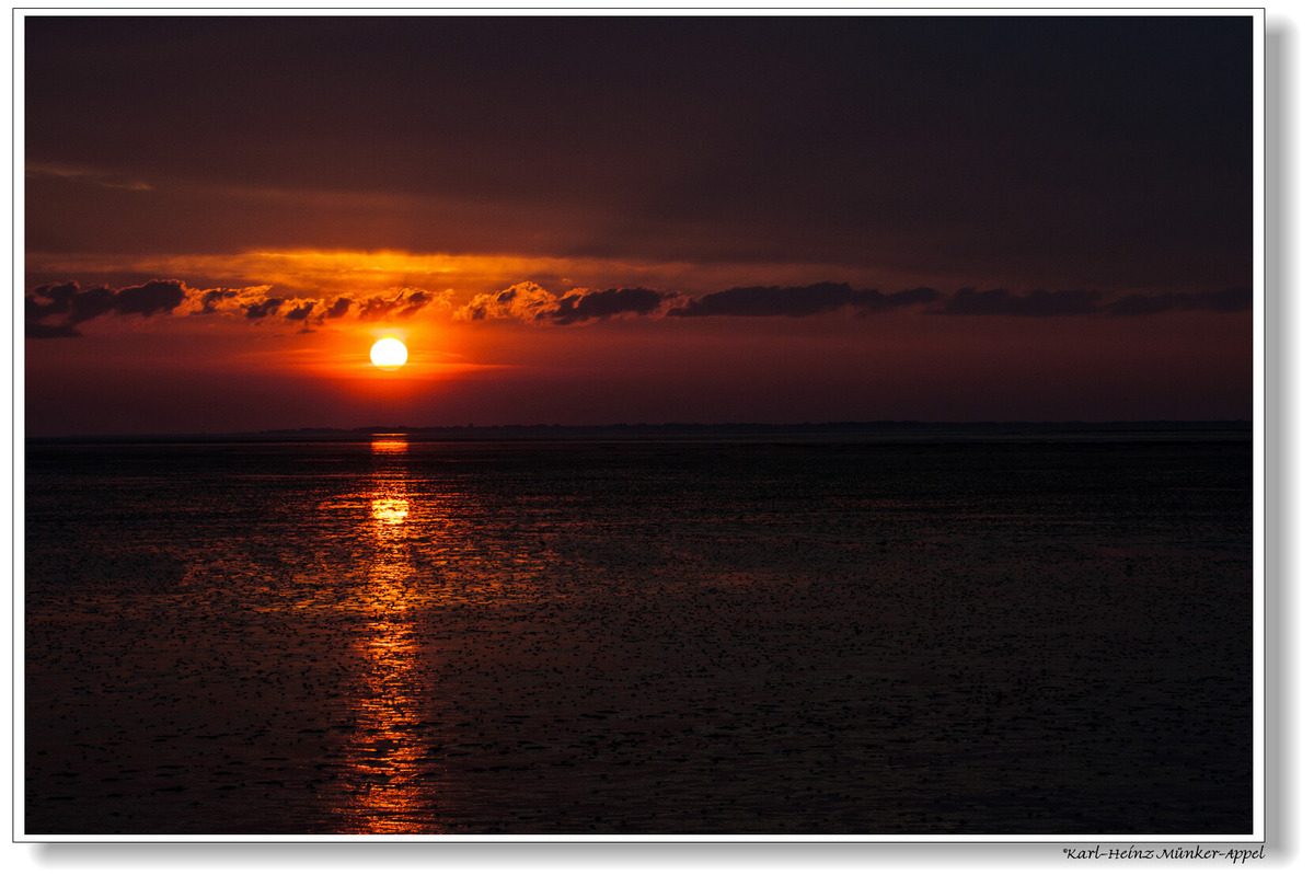 Sonnenuntergang am Dornumersiel