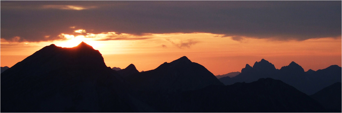 Sonnenuntergang und Gipfelglück
